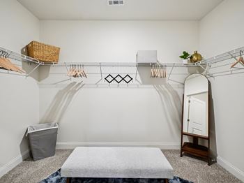 Generous walk-in closets with shelving